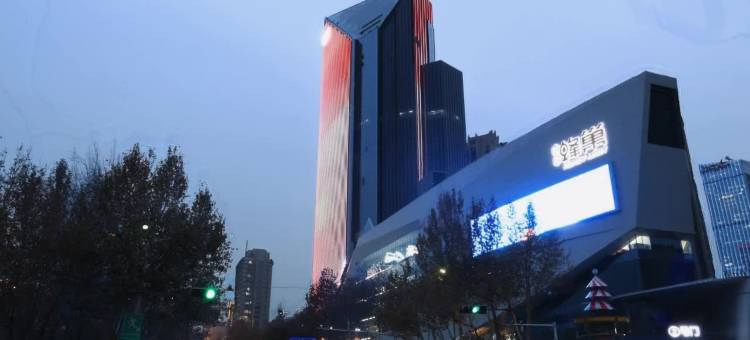 美乐居酒店(北国商城店)图片
