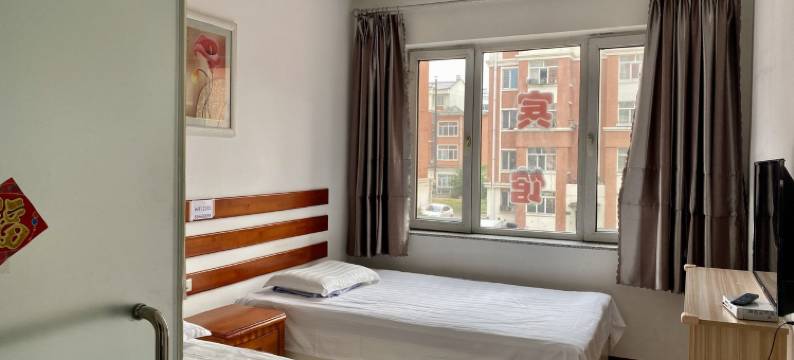 小镇家庭公寓(商业街1号分店)图片