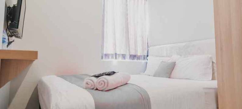 红多兹普拉斯酒店-近苏加诺哈达机场皇冠公园(RedDoorz Plus Near Soekarno Hatta Airport Taman Mahkota)图片