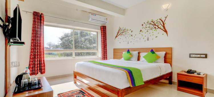 Treebo Atithi舒适酒店，距离Nisargadhama森林1公里(Treebo Atithi Comforts, 1 Km from Nisargadhama Forest)图片