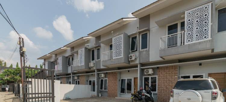 红多兹酒店@巨港惹兰德曼勒巴拉亚(RedDoorz @ Jalan Demang Lebar Raya Palembang)图片