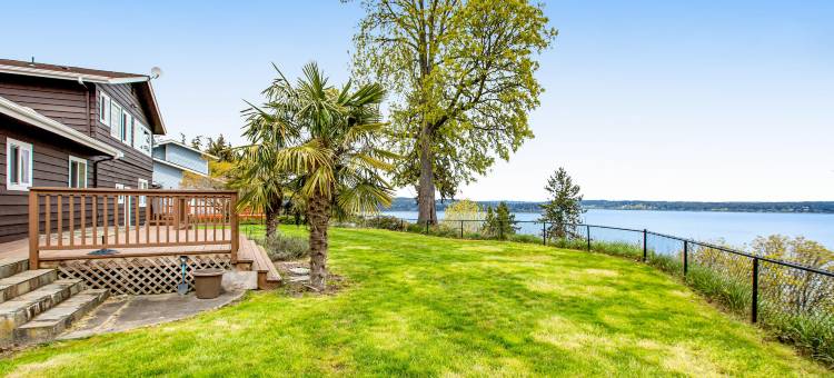 Soundfront home with WiFi, washer/dryer, central AC, and enclosed yard图片