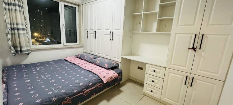 万兴公寓万达附近空调大床房技师学院(万达路分店)图片