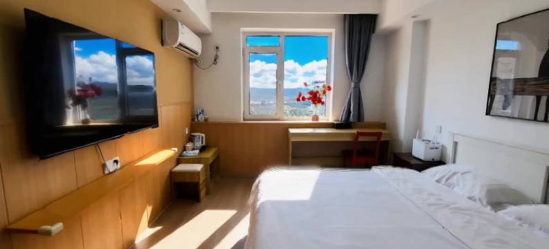 邻海畔公寓(万象城五四广场地铁站店)图片