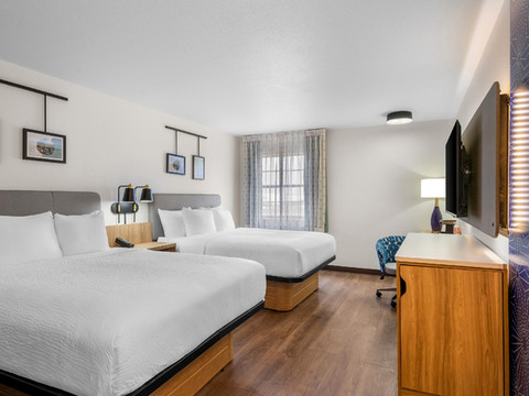 斯尔西大学附近的舒眠酒店及套房