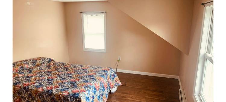 OYO东斯特劳兹堡波科诺斯的Werry's小屋汽车旅馆酒吧(Werry's Cottages Motel & Pub by OYO East Stroudsburg Poconos)图片