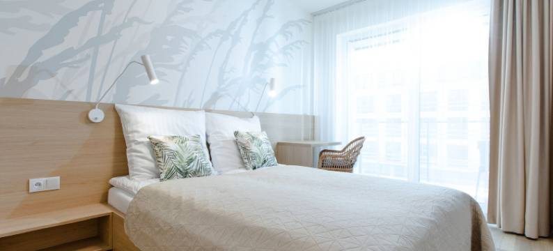 带河景的公寓，含桑拿和室内泳池(Apartment with Swimming Pool in Dziwnów)图片