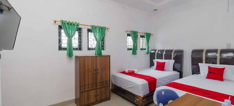 红门酒店Syariah尼尔斯塔修恩克雷塔阿皮基萨兰(RedDoorz Syariah Near Stasiun Kereta Api Kisaran)图片