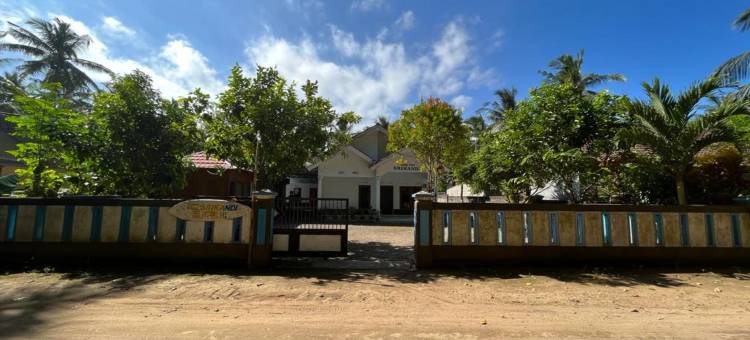 OYO 96881831 斯里甘地红岛海滩民宿，靠近潘切尔海滩(Hotel O Homestay Srikandi Pulau Merah BeachNearPantai Pancer)图片