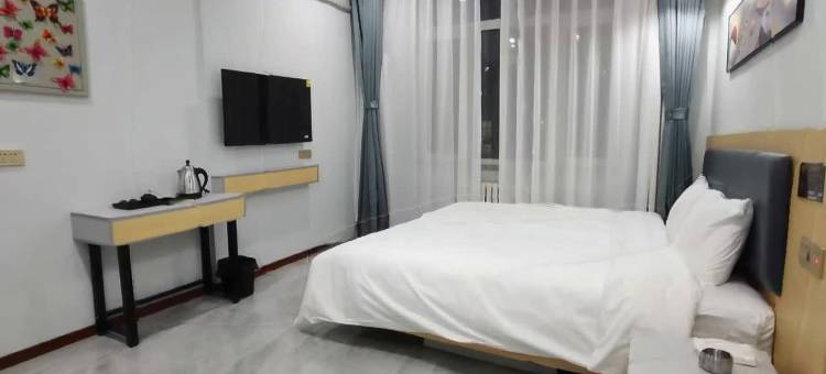 哈尔滨夜归人民宿(江北大学城地铁站店)图片