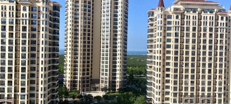 蓝海居小许公寓(闻涛路1号分店)图片