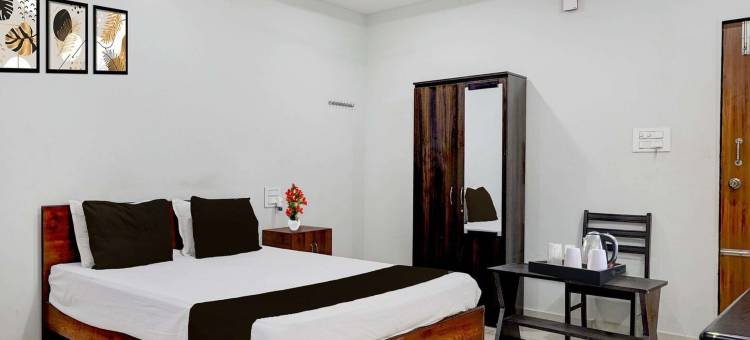 豪华迷你绕城内洛尔路(Super OYO Collection O Mini Bypass Nellore Road Formerly Amr Guest Inn)图片
