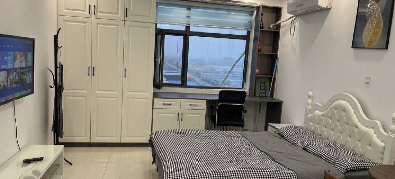 北方木都公寓威bfmdgy666民宿(创业路分店)图片