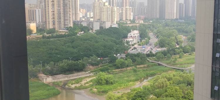 西溪花间龙湖新壹城店民宿(浐河东路分店)图片