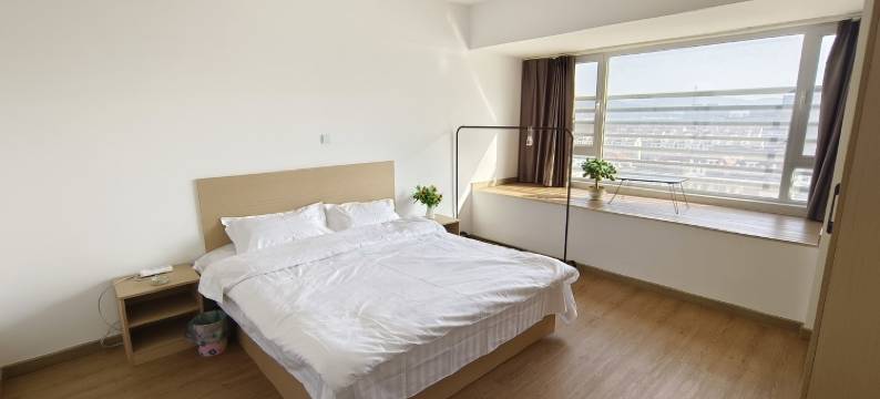 北站温馨房东宋温暖民宿(世昌大道分店)图片