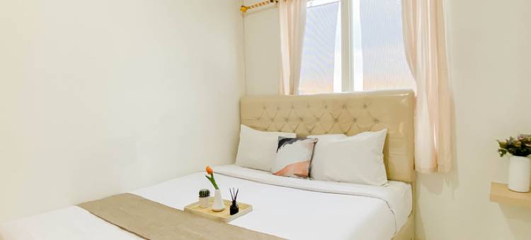 Nice and Warm 2BR at Podomoro Golf View Apartment By Travelio图片