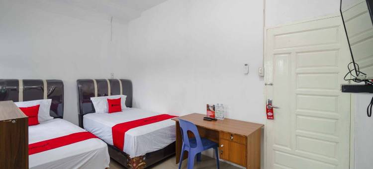 红门酒店Syariah尼尔斯塔修恩克雷塔阿皮基萨兰(RedDoorz Syariah Near Stasiun Kereta Api Kisaran)图片