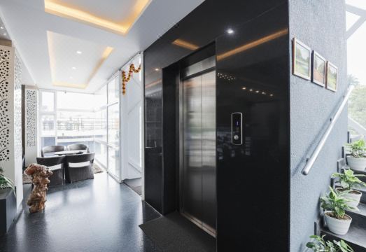 FabHotel Prime Suloka Towers - 500m from View Point, Kaveri River Hotel Overview