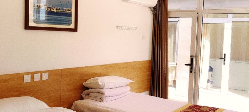 觉华岛渔家女宾馆图片