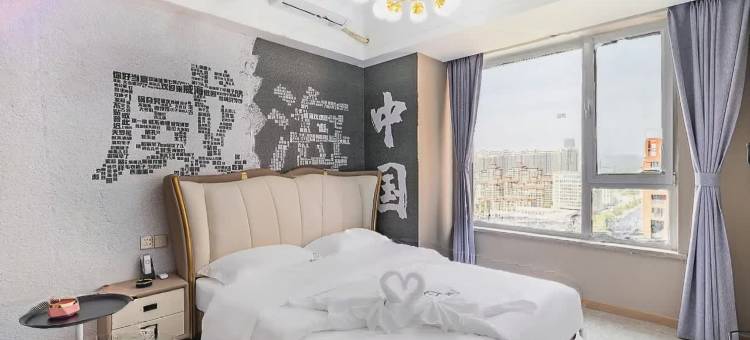 悦客 智能影音·城市设计师酒店 (威海高铁站韩乐坊店)图片