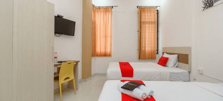 瑞德多兹酒店 - 近巨港贸易中心(RedDoorz at Tara Homestay Palembang)图片