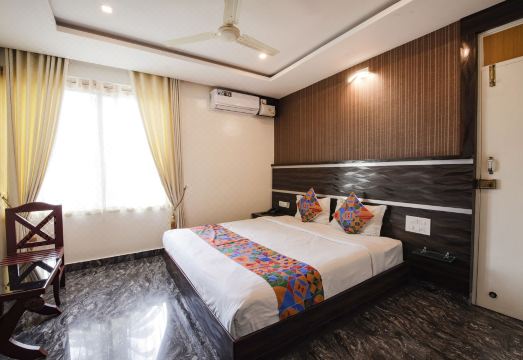 FabHotel Prime Suloka Towers - 500m from View Point, Kaveri River Hotel Overview
