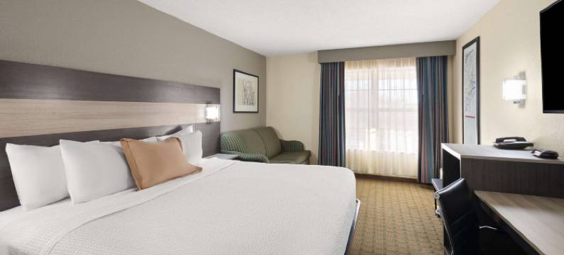 佩里国家展览场区域和I-75沿线Travelodge by Wyndham酒店(Travelodge by Wyndham Perry National Fairgrounds Area I-75)图片