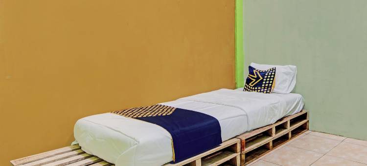 Hotel O 彭吉纳潘沙菲拉酒店，靠近穆斯塔明多柏迈1号住宅区(Hotel O Penginapan Syafira Near Perumahan Mustamindo Permai 1)图片