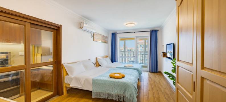 蓝海居小许公寓(闻涛路1号分店)图片