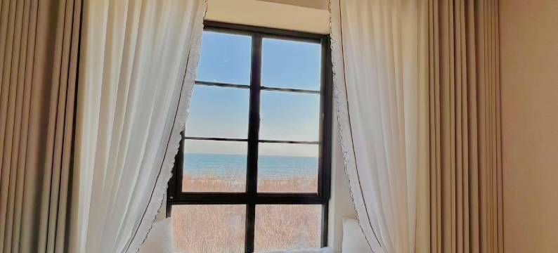 温馨阿那亚公寓(二号路分店)图片