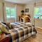 Riverfront Gem with Big Deck, Fishing & Adventure. Comfy Beds, Upgraded Beauty