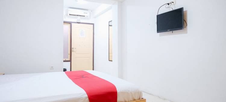 红多兹酒店-近占碑图古佩尔斯(RedDoorz Near Tugu Pers Jambi)图片