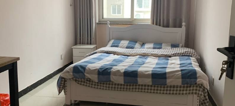 北门关民宿(御园路分店)图片