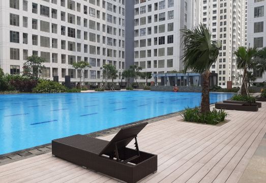 Comfy Studio Apartment with Extra Bed at M-Town Residence Hotel Overview