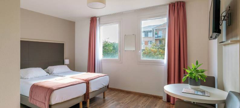 塞祖尔阿菲尔卡昂克洛斯宝姆阿酒店(Séjours & Affaires Caen le Clos Beaumois)图片