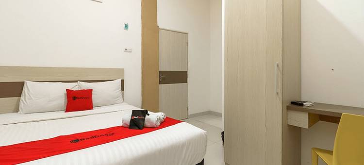 瑞德多兹酒店 - 近巨港贸易中心(RedDoorz at Tara Homestay Palembang)图片