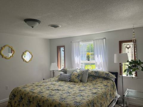 Enjoy views of beautiful Houghton Lake in charming LARGE home that sleeps 10.