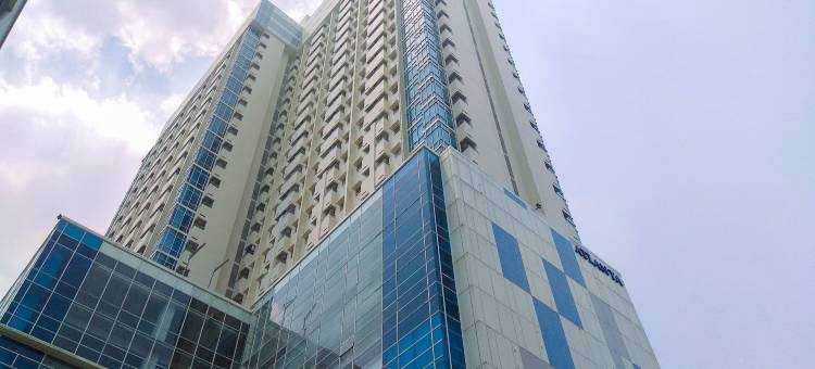 在Atlanta Residences的温暖如家的1卧室公寓，由Travelio提供(Warm and Homey 1Br Apartment at Atlanta Residences by Travelio)图片