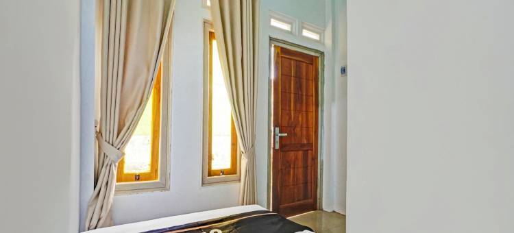 OYO 94834 阿琼娜民宿靠近塔曼(OYO 94834 Homestay Arjuna Near Taman Safari 2 Prigen)图片