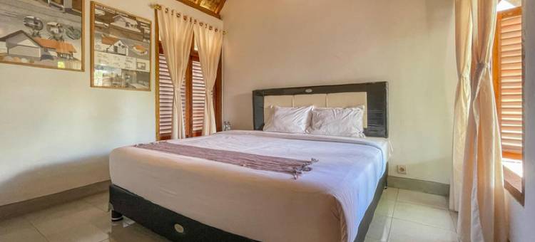 库塔海滩曼达利卡附近的艾拉民宿 - 红门酒店集团(Aira Homestay Near Pantai Kuta Mandalika Mitra RedDoorz)图片