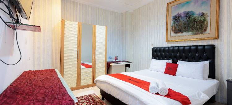 贡图尔拉亚塞蒂亚布迪红多兹Plus酒店(RedDoorz Plus @ Guntur Raya Setiabudi)图片