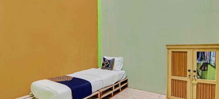 Hotel O 彭吉纳潘沙菲拉酒店，靠近穆斯塔明多柏迈1号住宅区(Hotel O Penginapan Syafira Near Perumahan Mustamindo Permai 1)图片