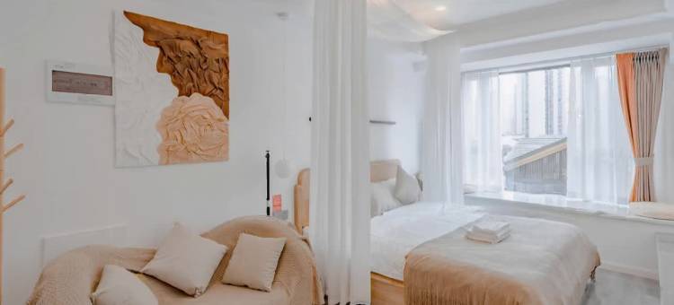 栖牛投影自助公寓(乐山世豪广场店)图片