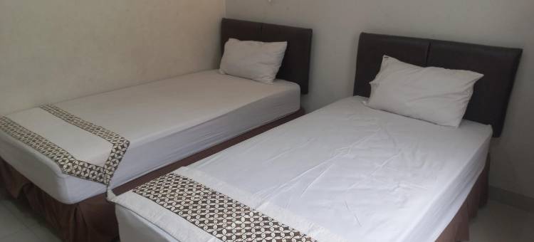 Capital O 93872 Natura宾馆伊斯兰教近普禾加多市中心广场(Capital O 93872 Natura Guest House Syariah Near Alun Alun Kota Purwokerto)图片