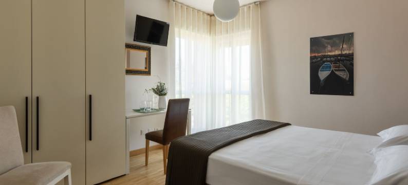 维罗马多西客房和公寓旅馆(Vialeromadodici Rooms & Apartments)图片