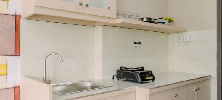 宾塔罗图标公寓舒适而温馨的工作室房间(Comfortable and Cozy Studio Room at Bintaro Icon Apartment)图片