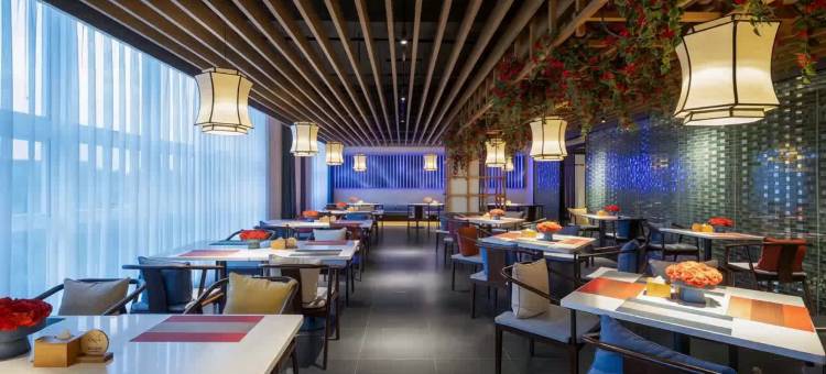 海口仟那酒店(万绿园友谊阳光城店)图片