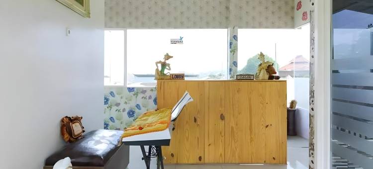 格利亚姆尔雅旅馆(Griya Mulya Near Alun Alun Batu Mitra RedDoorz)图片