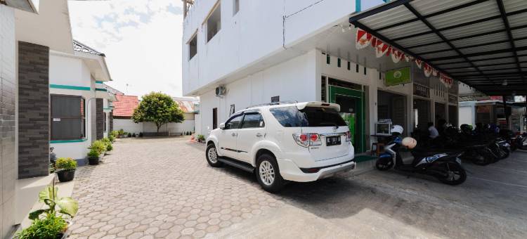 红门沙里亚酒店，靠近乌利勒港口，班达亚齐(RedDoorz Syariah Near Pelabuhan Ulee Lheue Banda Aceh)图片