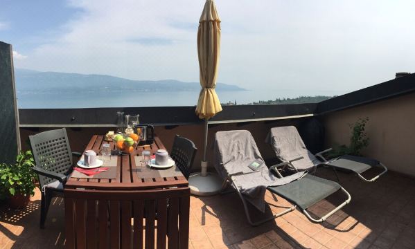 Casa Fornico 8, terrace with breathtaking views of Lake Garda Hotel Overview